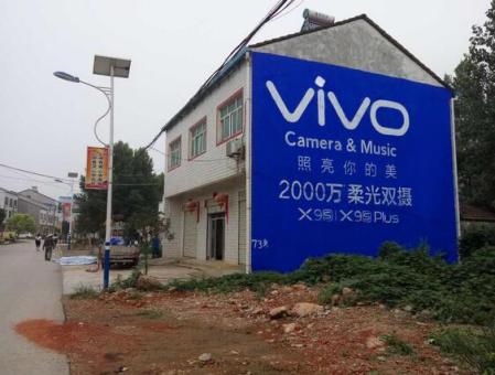  昆山刷墙广告和喷绘墙体广告哪个效果好？